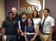 Visiting Rutgers Scholars learn about BRAVO! Finance from Les Humienny and Trupti Shah.