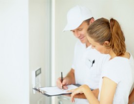 Woman consulting with an electrician